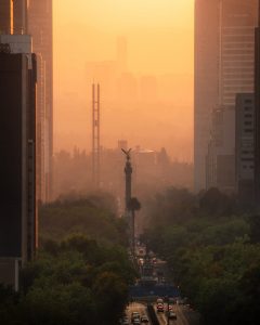 view on a street in mexico city at sunset