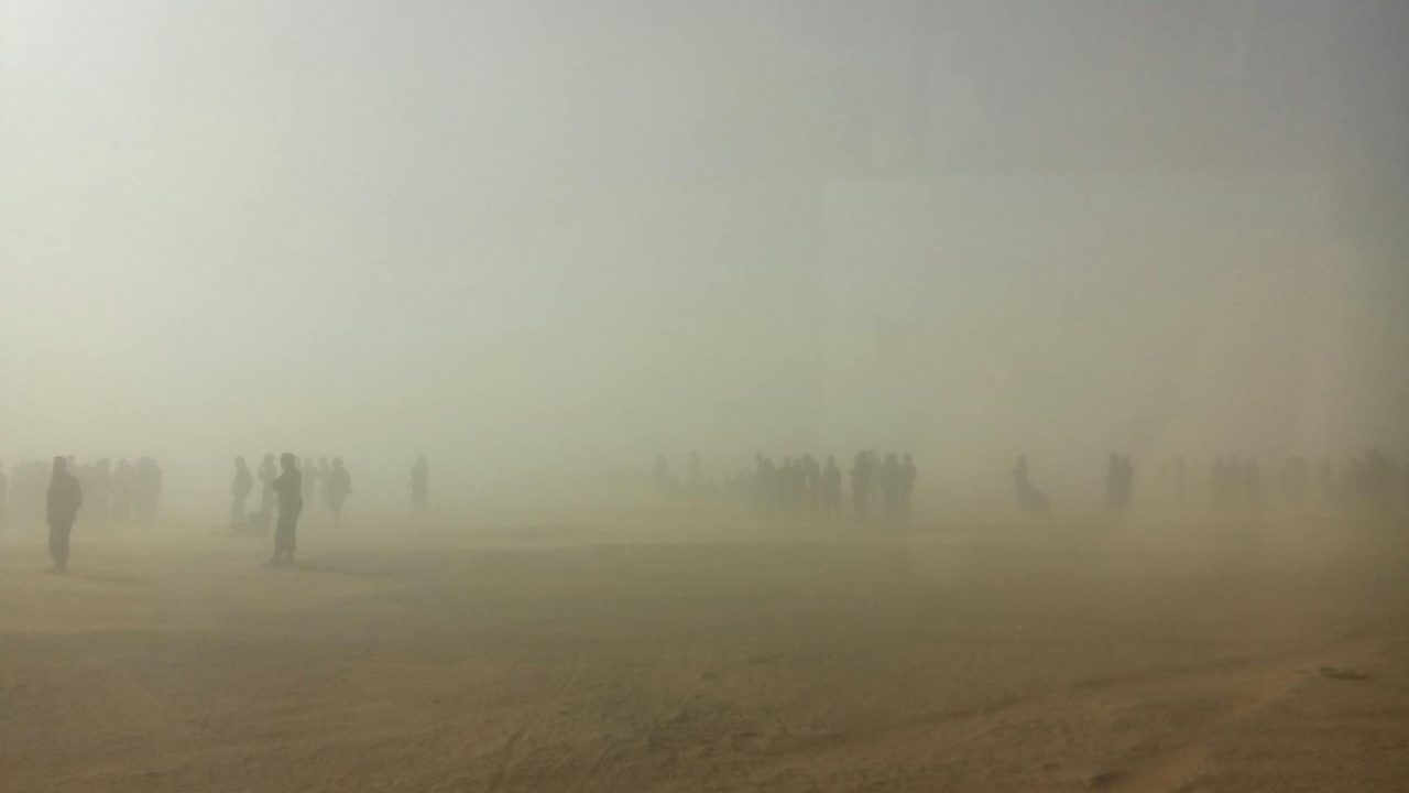 thick fog covering the people standing