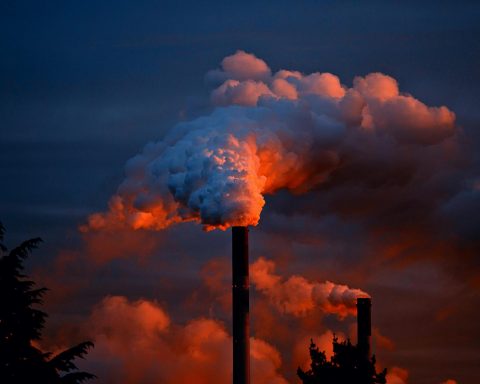 smoke coming out of factory pipes